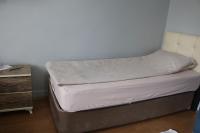Postel nebo postele na pokoji v ubytování Zafer Hostel