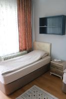 Postel nebo postele na pokoji v ubytování Zafer Hostel