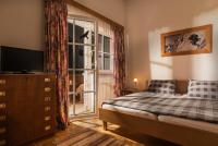 Łóżko lub łóżka w pokoju w obiekcie Ferienwohnung Salzburg