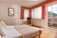 Telewizja i/lub zestaw kina domowego w obiekcie Ferienwohnung Salzburg