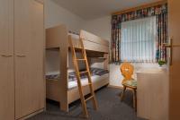 Łóżko lub łóżka w pokoju w obiekcie Ferienwohnung Salzburg
