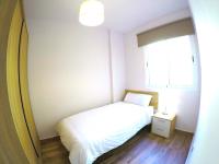 Postel nebo postele na pokoji v ubytování Nina Apartment