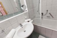 Łazienka w obiekcie Hotel Garni Rifflsee
