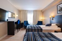 Postel nebo postele na pokoji v ubytování Quality Hotel Florø