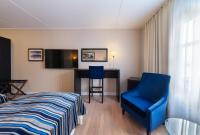 Postel nebo postele na pokoji v ubytování Quality Hotel Florø