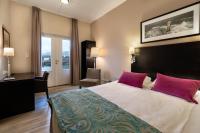 Postel nebo postele na pokoji v ubytování Quality Hotel Florø