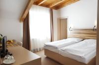 Postel nebo postele na pokoji v ubytování Hotel Monínec