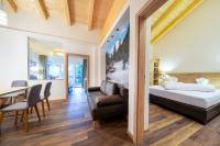 Ein Bett oder Betten in einem Zimmer der Unterkunft Hotel Post Krimml