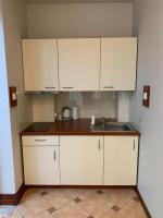 Kuchyňa alebo kuchynka v ubytovaní Apartamenty Superior w Rewalu