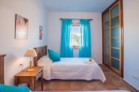 A bed or beds in a room at Eslanzarote Villa Caracola, Super Wifi, Sat tv
