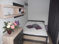 Postel nebo postele na pokoji v ubytování Apartament-Studio