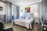 Posteľ alebo postele v izbe v ubytovaní Admiral Hotel