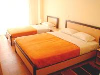 Postel nebo postele na pokoji v ubytování Hotel Victoria