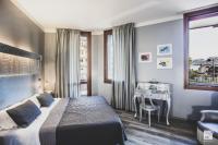 Posteľ alebo postele v izbe v ubytovaní Admiral Hotel