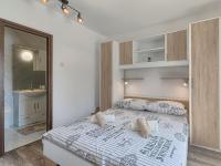 Łóżko lub łóżka w pokoju w obiekcie Holiday Home Evelina by Interhome