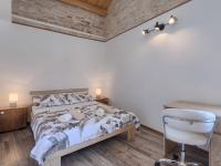 Łóżko lub łóżka w pokoju w obiekcie Holiday Home Evelina by Interhome