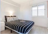 Postel nebo postele na pokoji v ubytování Calafell playa lateral mar