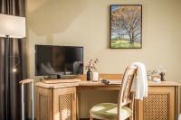 Telewizja i/lub zestaw kina domowego w obiekcie Hotel Sieghard Zillertal