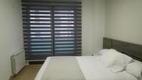 Posteľ alebo postele v izbe v ubytovaní Apartamentos Palacio Azcárate Calle Calvario