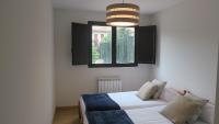 Posteľ alebo postele v izbe v ubytovaní Apartamentos Palacio Azcárate Calle Calvario