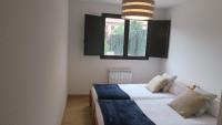 Posteľ alebo postele v izbe v ubytovaní Apartamentos Palacio Azcárate Calle Calvario