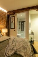 Posteľ alebo postele v izbe v ubytovaní Arenal AC by Staynnapartments