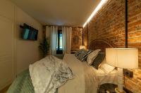 Televízia a/alebo spoločenská miestnosť v ubytovaní Arenal AC by Staynnapartments