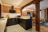 Kuchyňa alebo kuchynka v ubytovaní Arenal AC by Staynnapartments