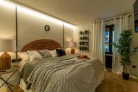 Posteľ alebo postele v izbe v ubytovaní Arenal AC by Staynnapartments