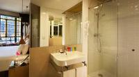 a bathroom with a sink and a shower at Axel Hotel Barcelona - Adults Only in Barcelona