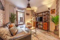 Telewizja i/lub zestaw kina domowego w obiekcie Apartamento Gran Via Center