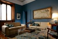 a living room with two couches and a table at Villa Spalletti Trivelli - Small Luxury Hotels of the World in Rome