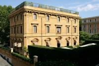 a large brick building with a glass dome on top at Villa Spalletti Trivelli - Small Luxury Hotels of the World in Rome