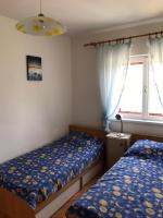 Posteľ alebo postele v izbe v ubytovaní Family friendly holiday home "Ana"
