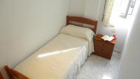 Postel nebo postele na pokoji v ubytování ConilPlus Apartment BODEGA