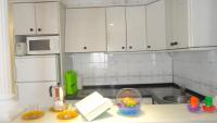 Kuchyň nebo kuchyňský kout v ubytování ConilPlus Apartment BODEGA