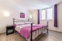 Posteľ alebo postele v izbe v ubytovaní Apartments Ivica 1706