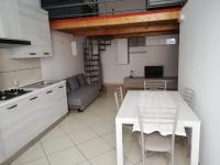 A kitchen or kitchenette at Aurora Apartment nel cuore di Napoli