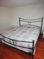 A bed or beds in a room at Aurora Apartment nel cuore di Napoli