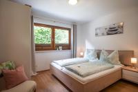 Łóżko lub łóżka w pokoju w obiekcie Appartement Annabella