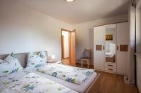 Łóżko lub łóżka w pokoju w obiekcie Appartement Annabella