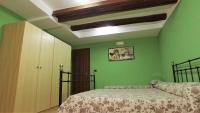 Posteľ alebo postele v izbe v ubytovaní B&B Ersilia