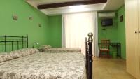 Posteľ alebo postele v izbe v ubytovaní B&B Ersilia