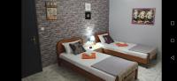 A bed or beds in a room at Hotel Efyra