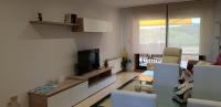 A television and/or entertainment centre at Resid. Balea Marítima