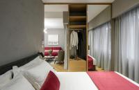 Posteľ alebo postele v izbe v ubytovaní Olvios Luxury Suites