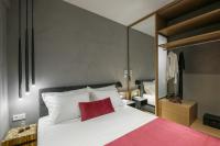 Posteľ alebo postele v izbe v ubytovaní Olvios Luxury Suites