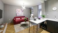 Televízia a/alebo spoločenská miestnosť v ubytovaní Olvios Luxury Suites