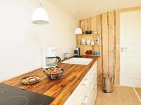 Kuchyň nebo kuchyňský kout v ubytování Holiday home Bogense II