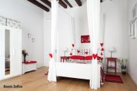Postel nebo postele na pokoji v ubytování Aria e Luce Suites a Venezia